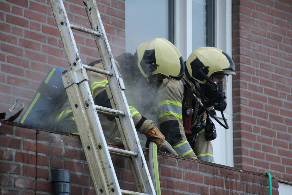 Brand in afzuigkap van woning