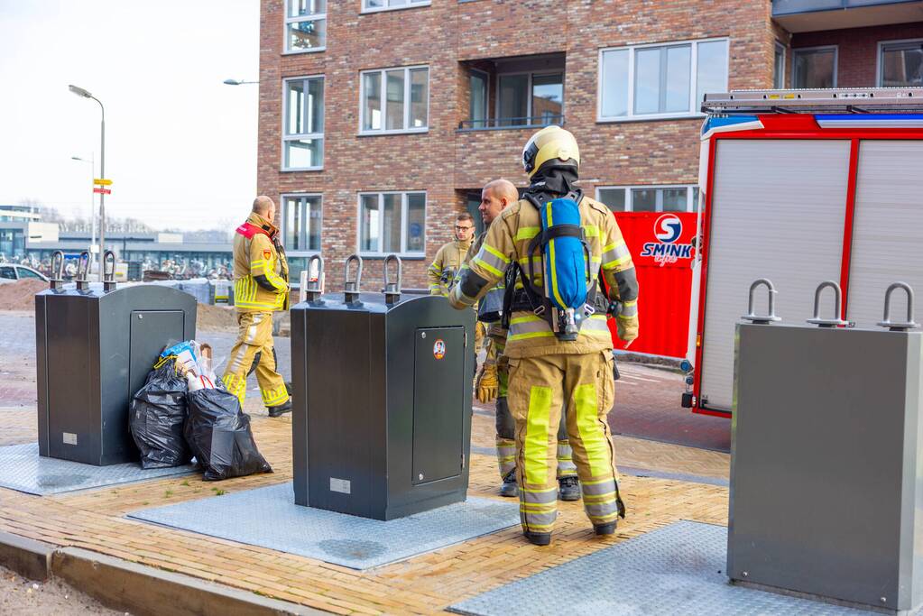 Brand in ondergrondse PMD-container