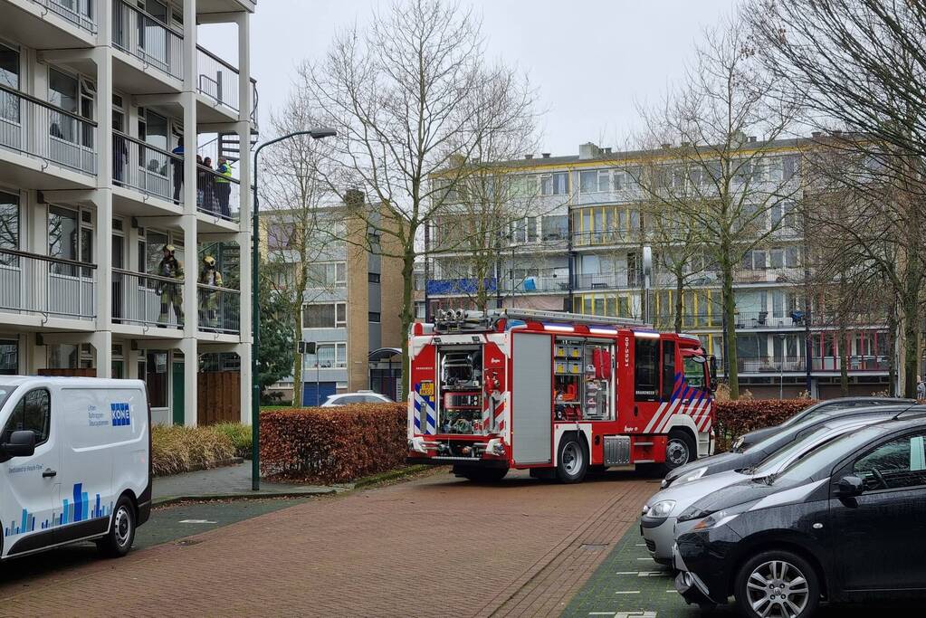 Brand in keuken van flatwoning