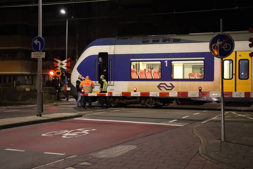 Scooter aangereden door trein