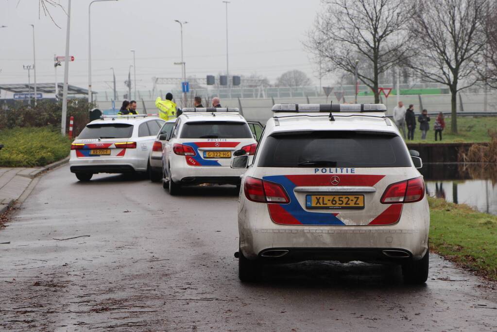 Auto klemgereden na achtervolging