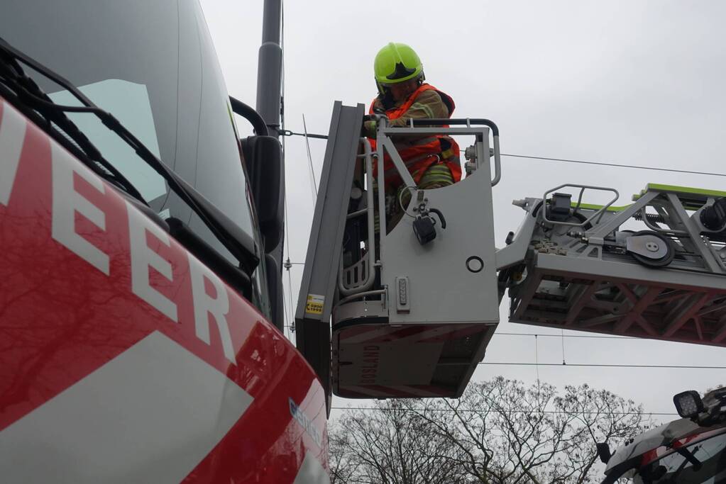 Lichtmastreclame waait los