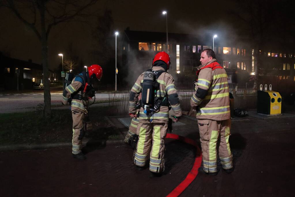 Rookontwikkeling bij brand in papiercontainer