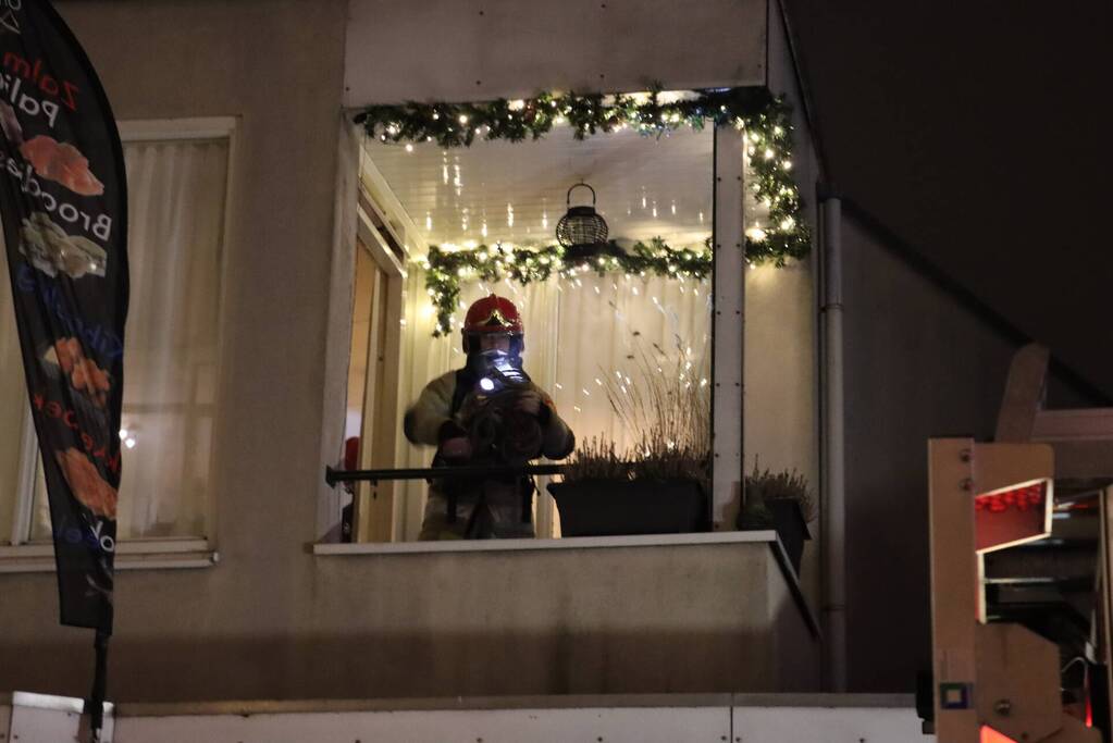 Korte felle wasmachinebrand in bovenwoning