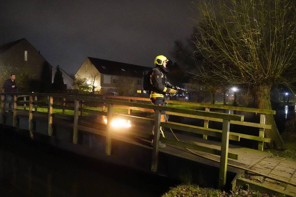 Brandstichting op houten brug