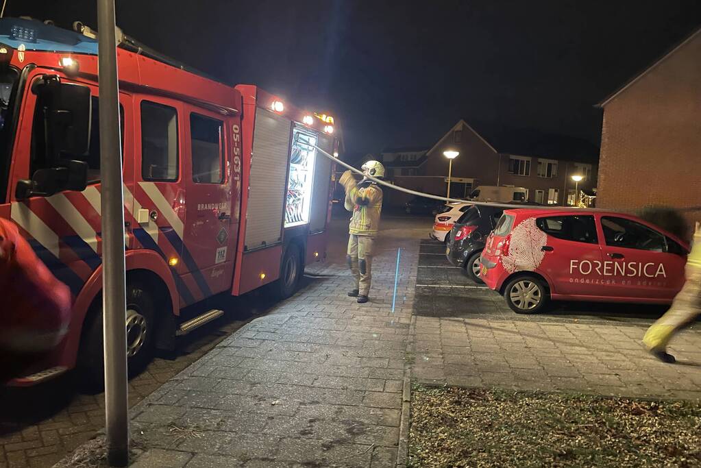 Brandweer blust buitenbrand