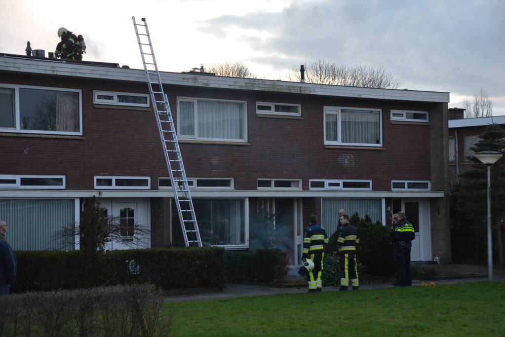 Woning vol rook door schoorsteenbrand
