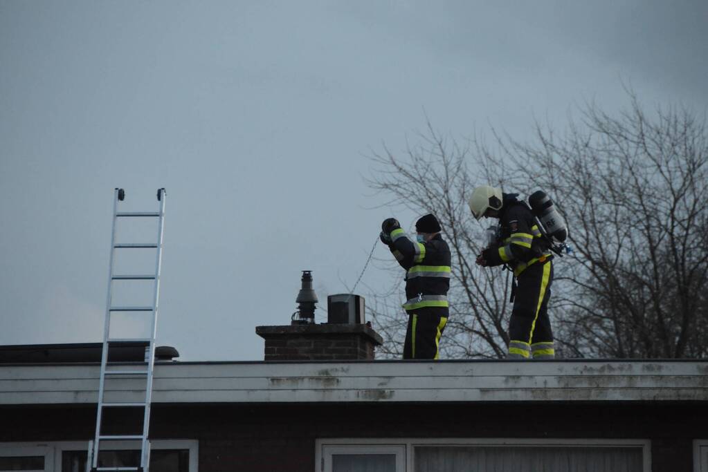Woning vol rook door schoorsteenbrand