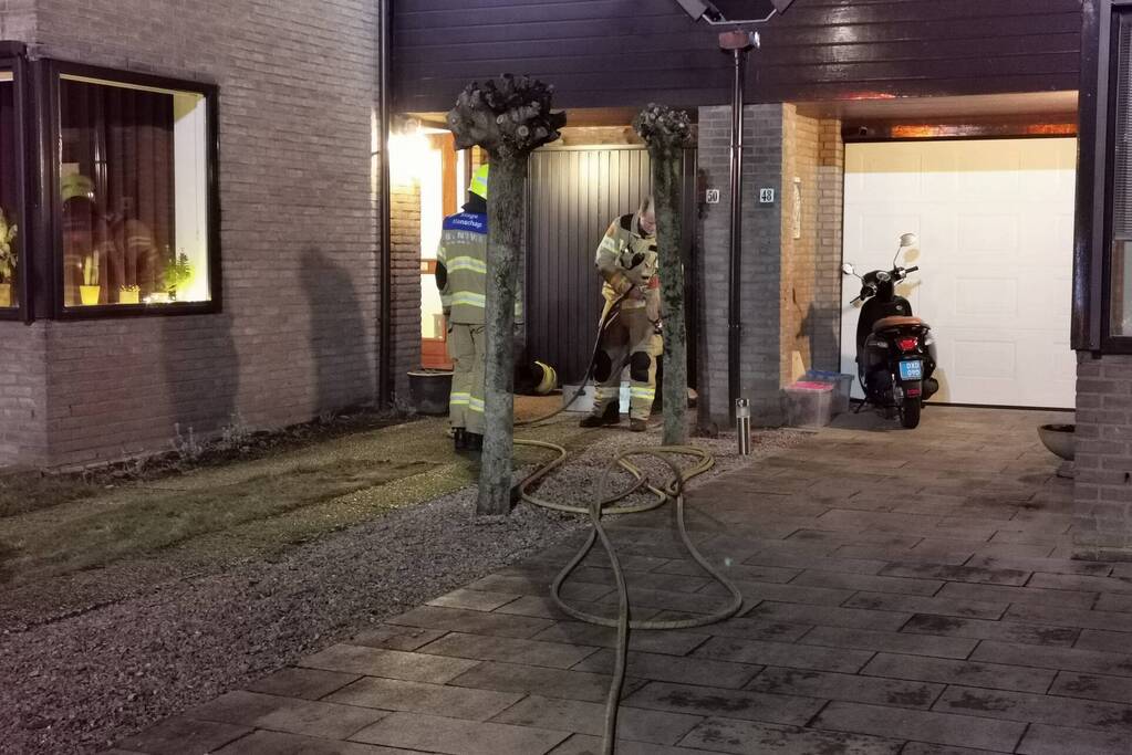 Brand in schoorsteen van woning