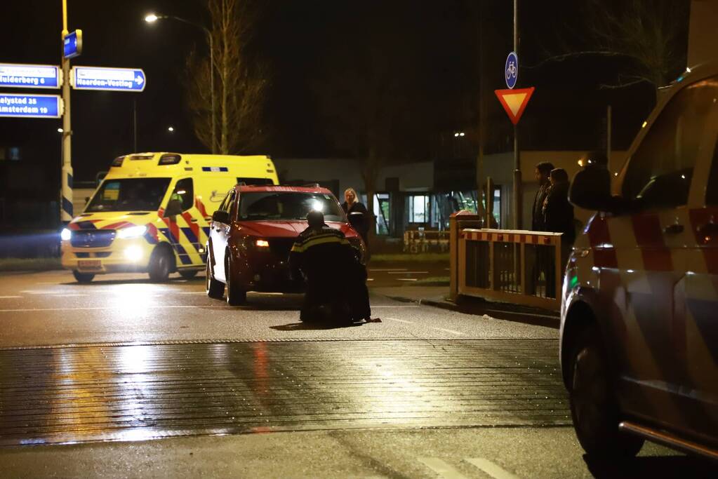 Persoon met scooter onderuit door gladheid