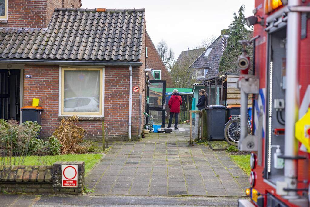 Rommel in woning vliegt in brand