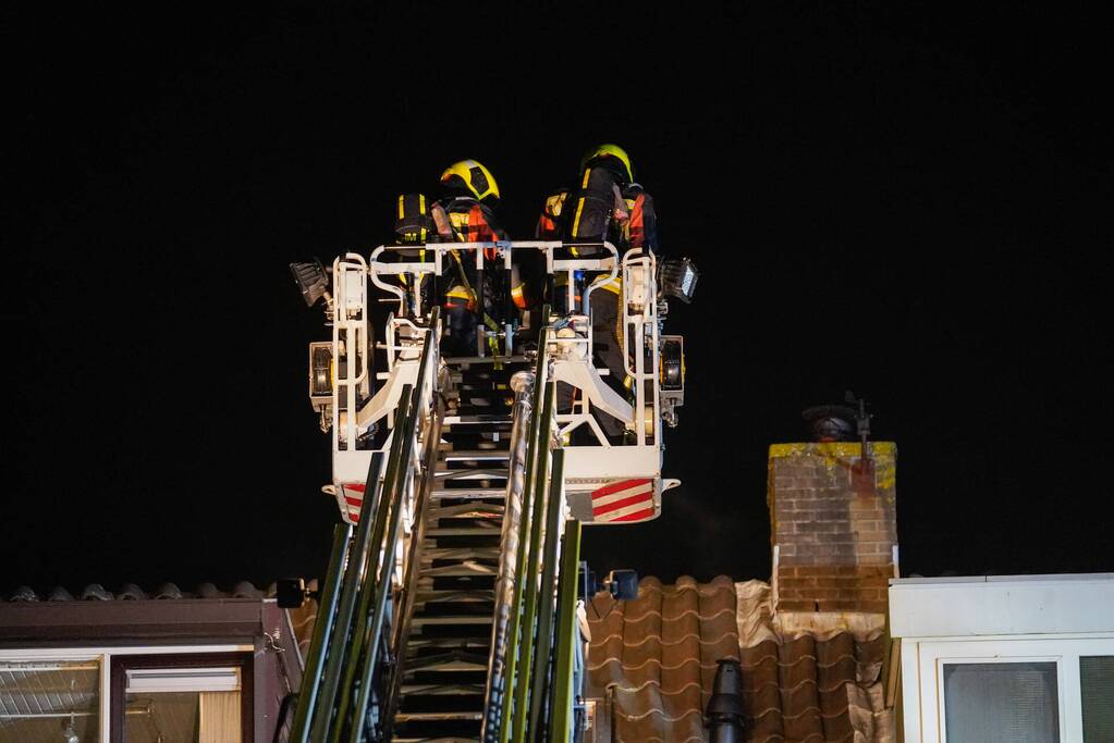 Schoorsteen geveegd na brand