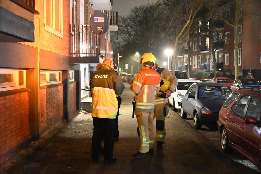 Man gewond bij woningbrand, parkiet overleden