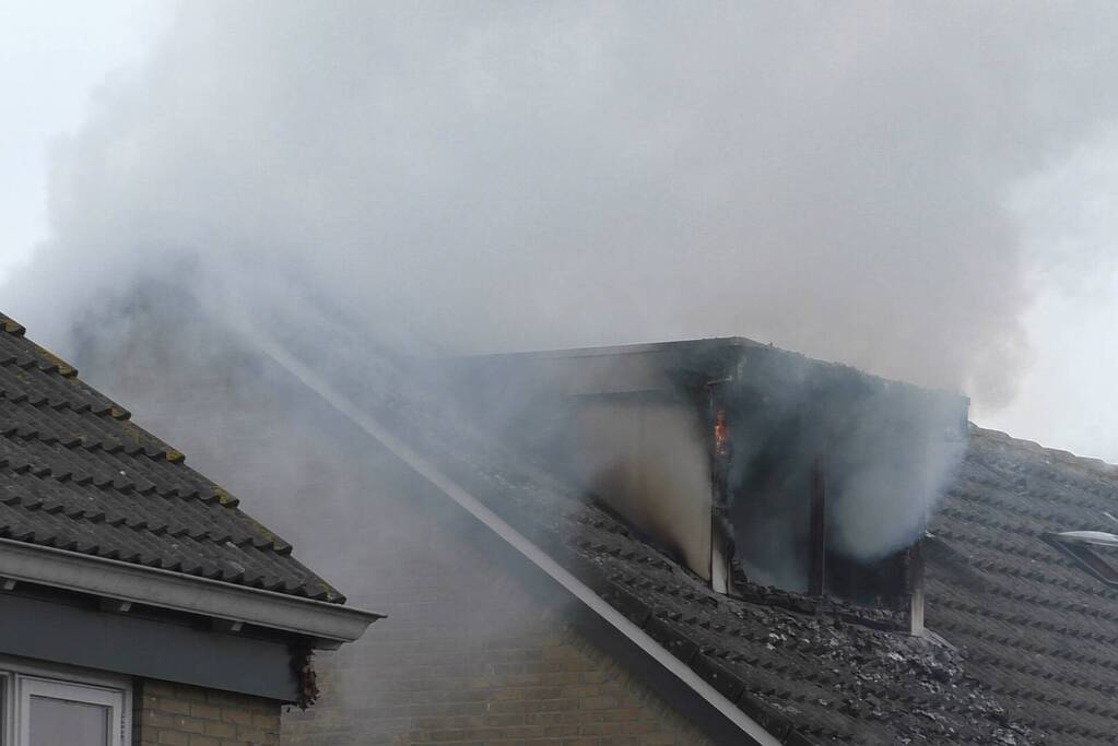 Uitslaande brand in woning