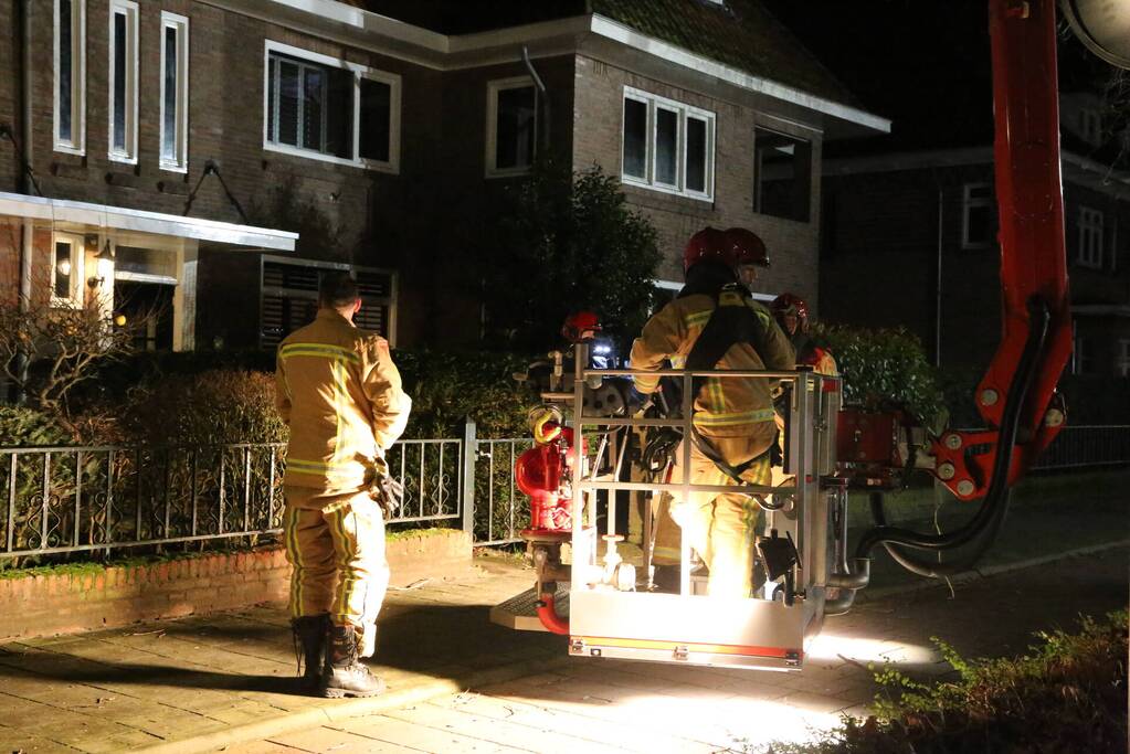 Brand in schoorsteen van woning