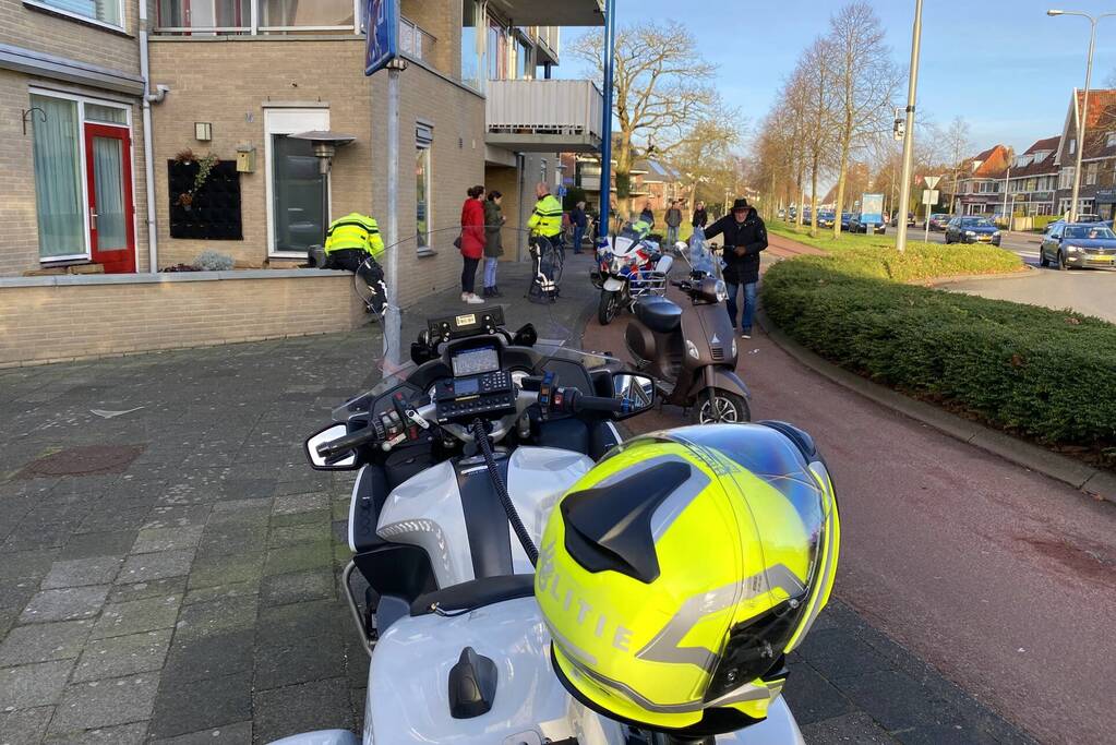 Scooter en fietser botsen op elkaar