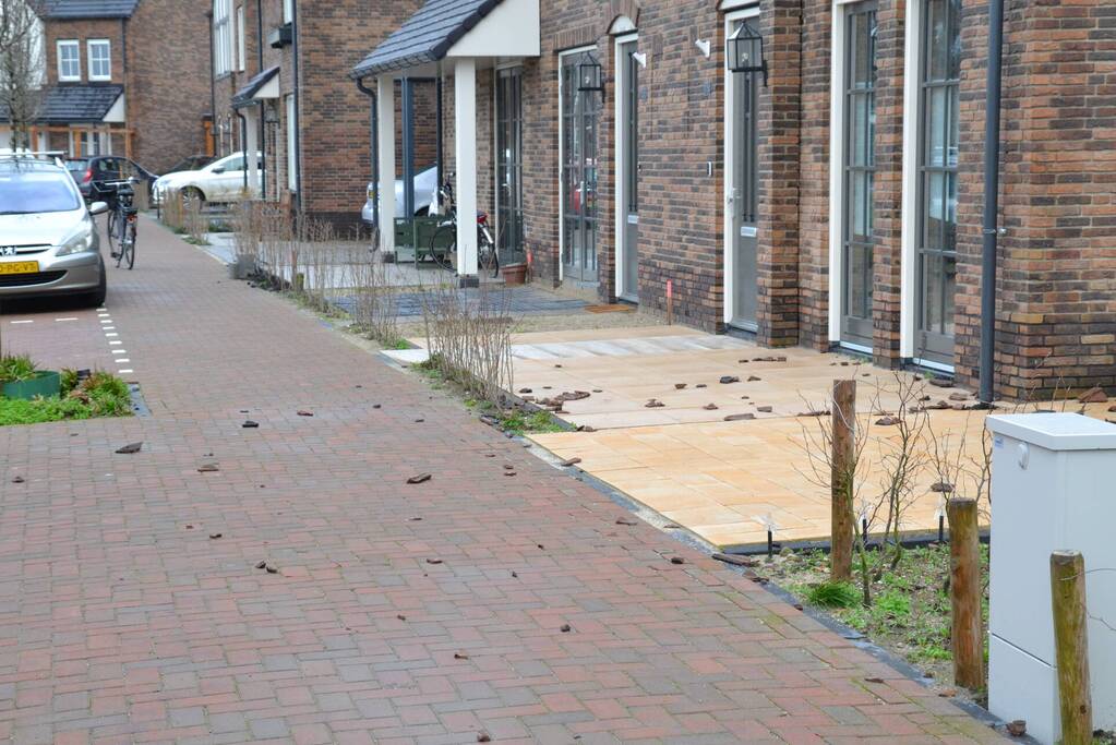 Dakpannen waaien van dak