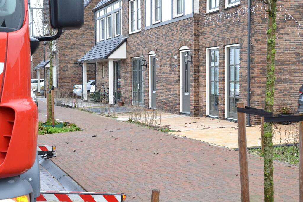 Dakpannen waaien van dak