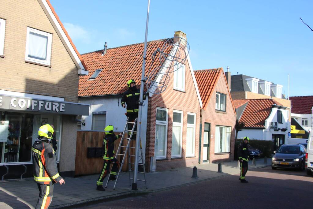 Sierverlichting verwijderd door de brandweer