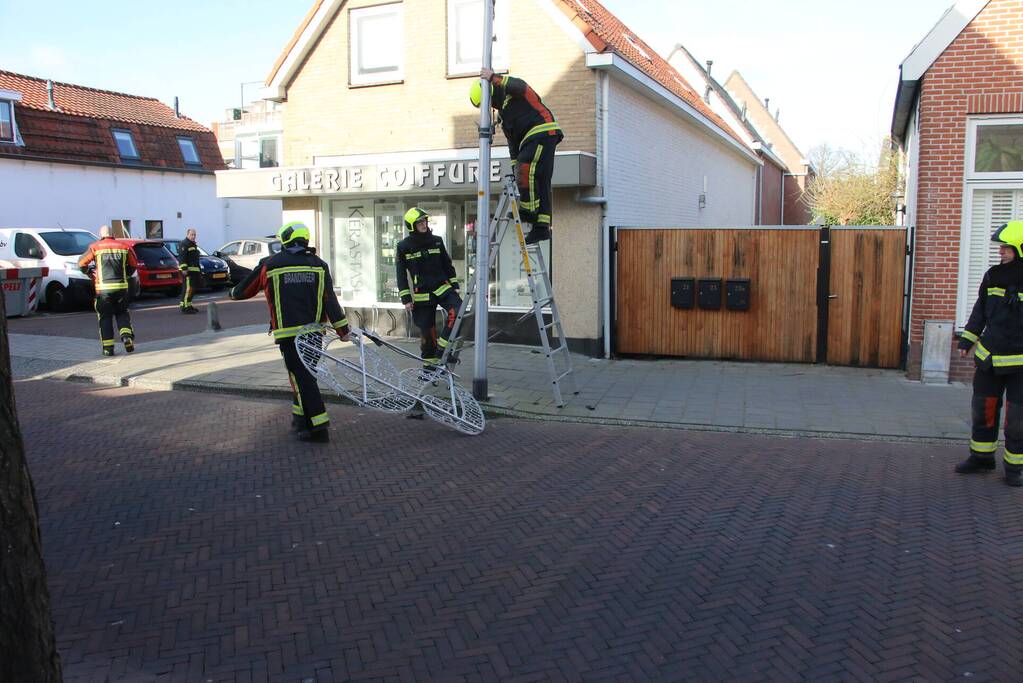 Sierverlichting verwijderd door de brandweer