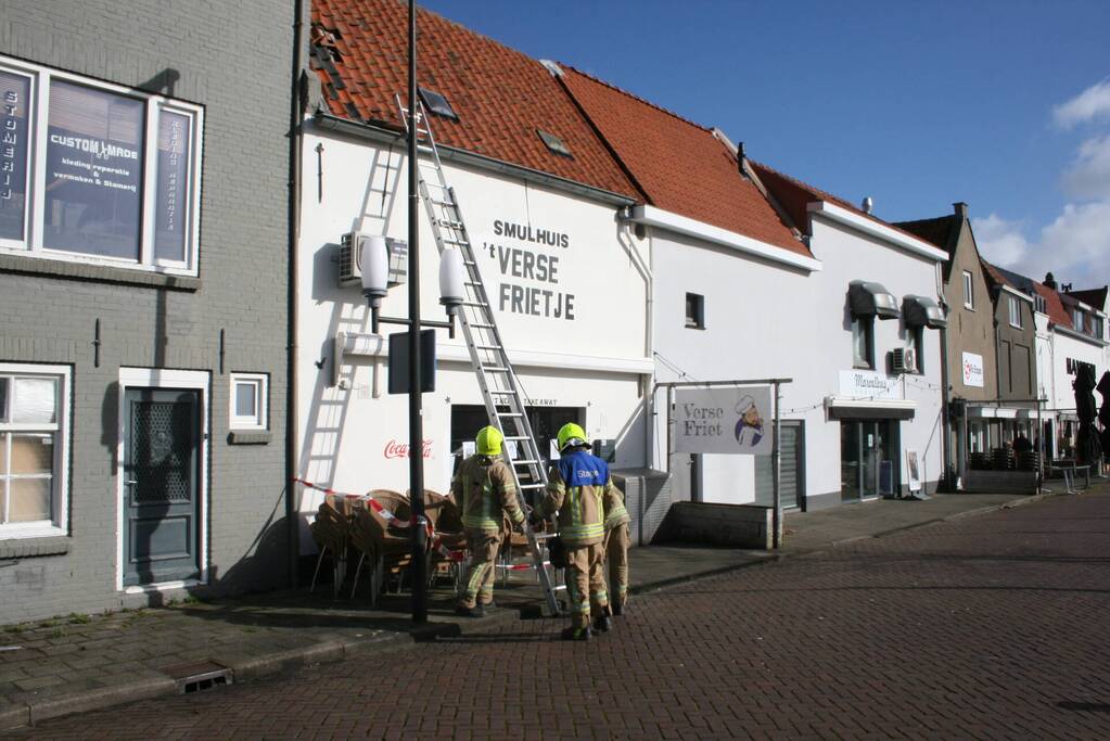 Brandweer ingezet voor stormschades in winkelgebied