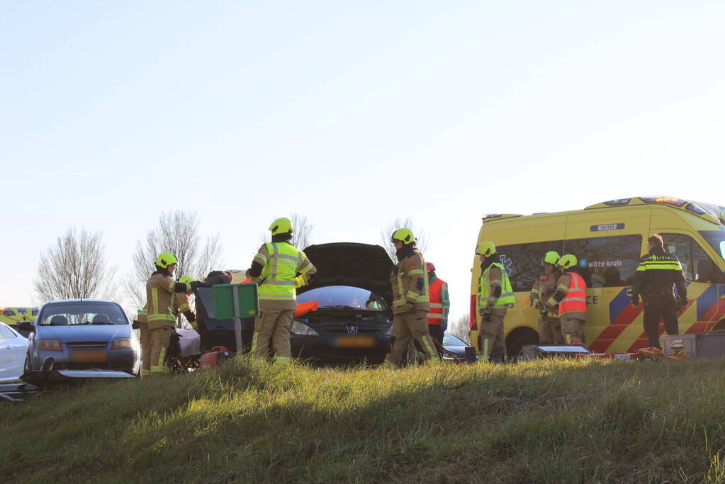 Inzittende bekneld na kettingbotsing