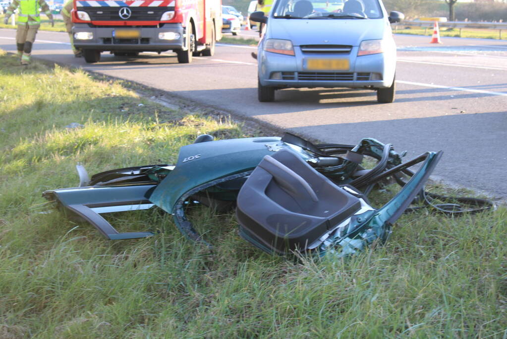 Inzittende bekneld na kettingbotsing