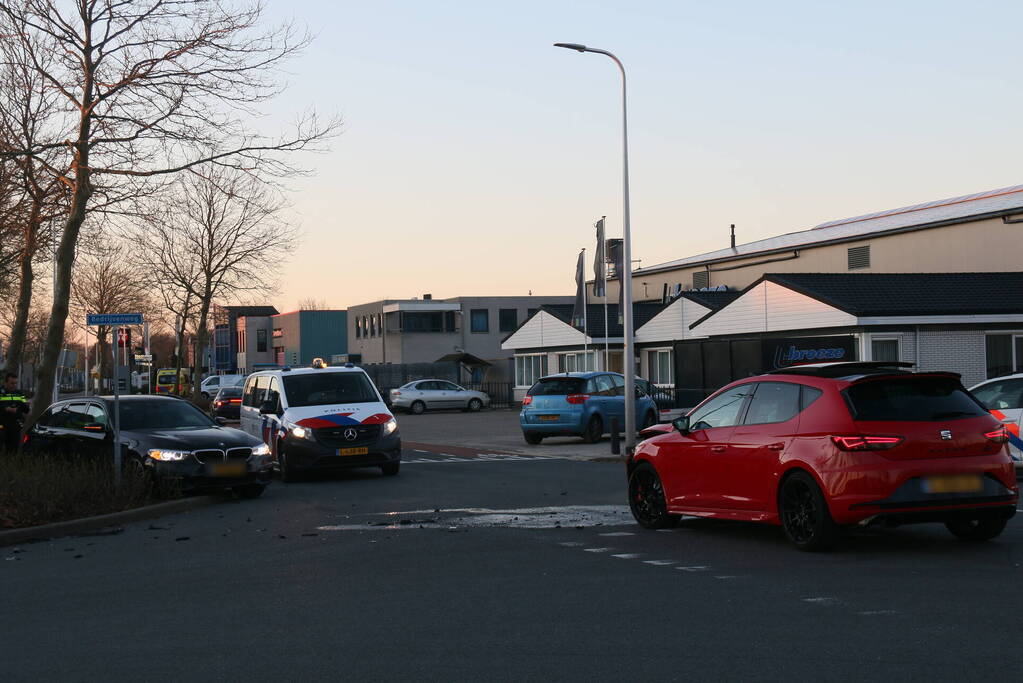 Schade na botsing op kruising