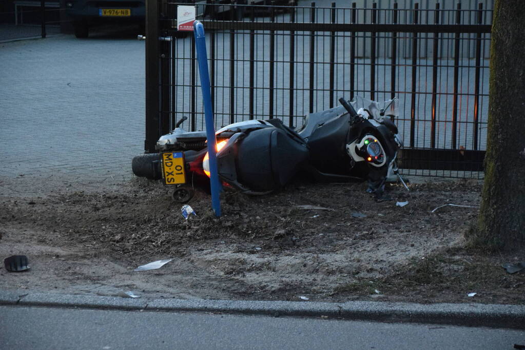 Gewonden bij ongeval tussen auto en motorscooter