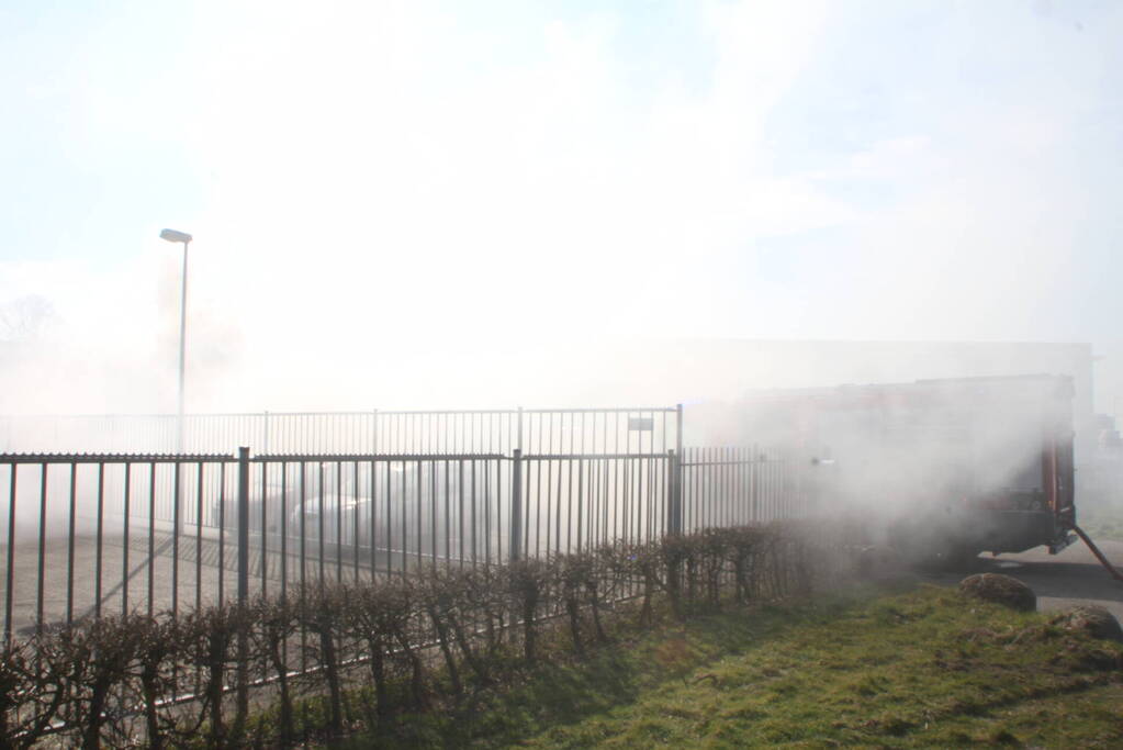 Forse rookontwikkeling bij brand in container