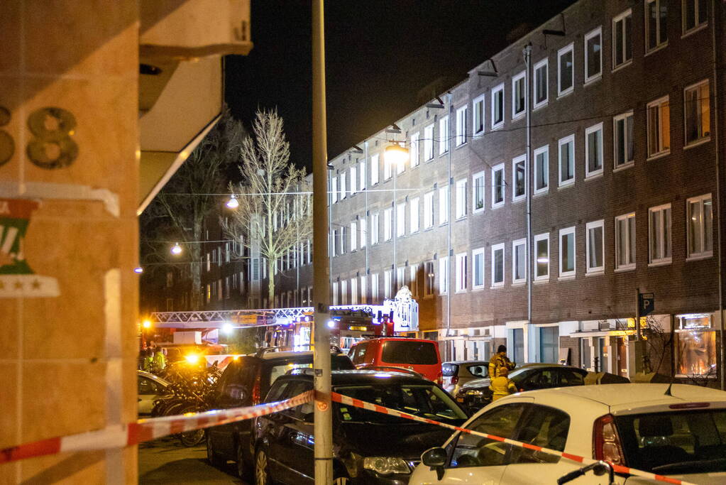 Meerdere woningen ontruimd bij grote brand