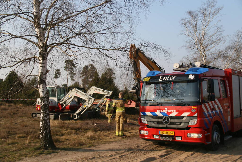 Graafmachine zwaar beschadigd vanwege brand
