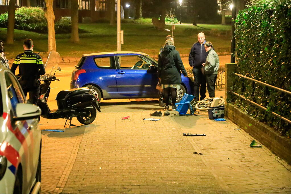 Fietser en snorfietser frontaal in botsing