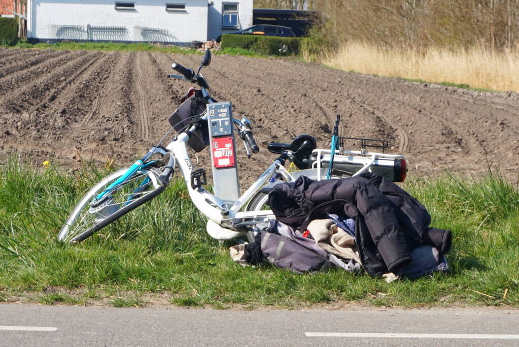 Man op fiets aangereden door afslaande tractor