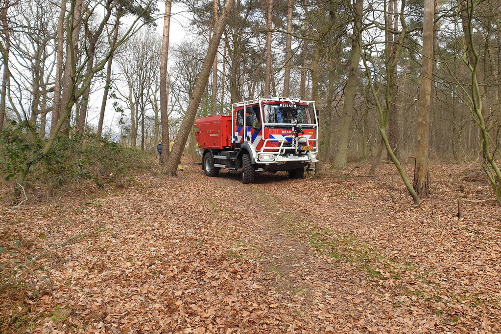 Rookontwikkeling vanwege brand in stuk bosschage