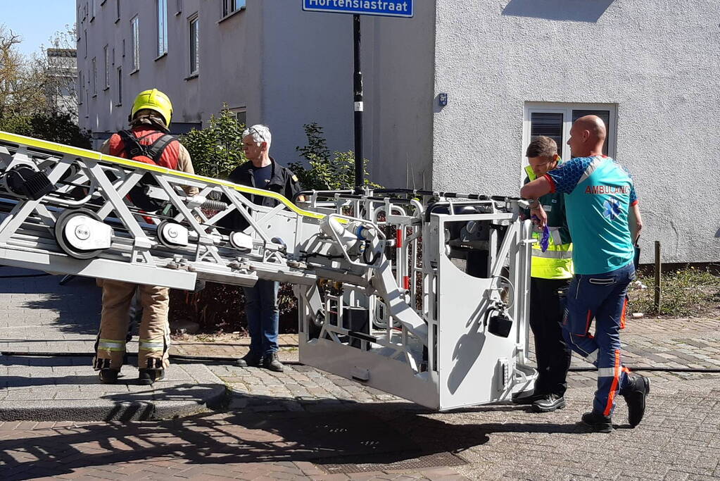 Brand in slaapkamer van portiekwoning