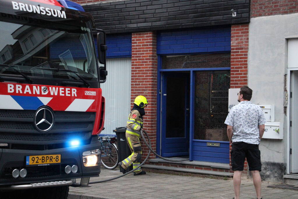 Brand aan achterzijde van woning