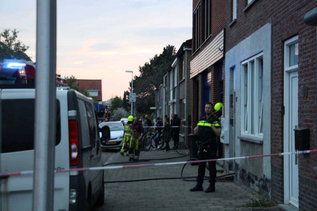 Brand aan achterzijde van woning