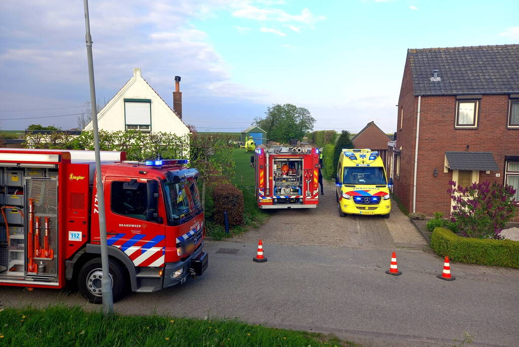 Persoon komt onder schranklader