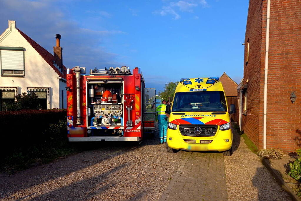 Persoon komt onder schranklader