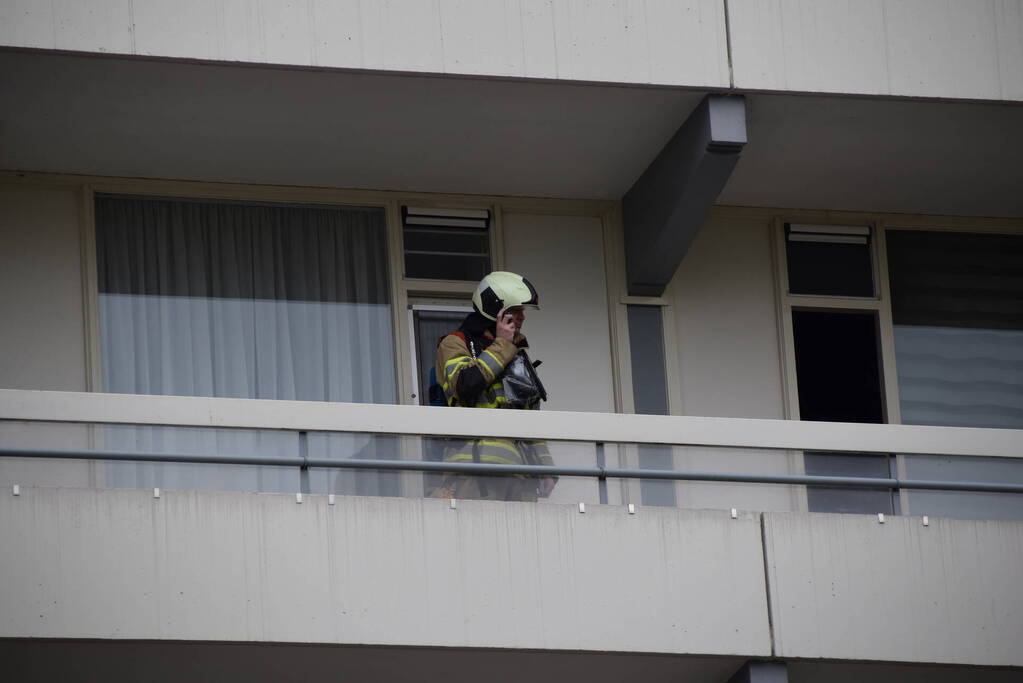 Flatwoning vol rook door vergeten pan