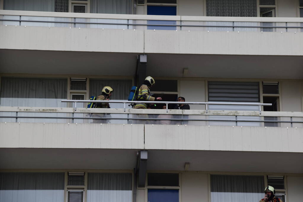 Flatwoning vol rook door vergeten pan