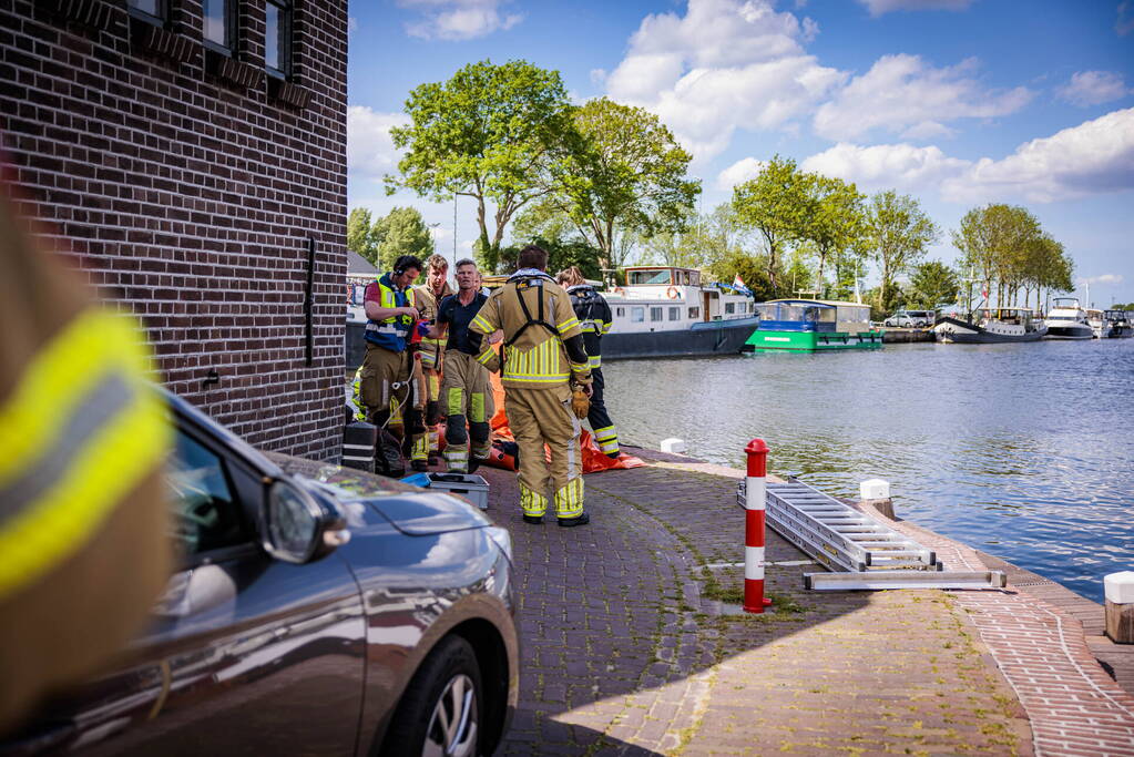 Schipper redt persoon uit het water