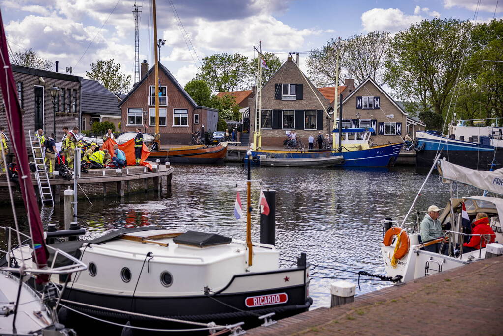 Schipper redt persoon uit het water