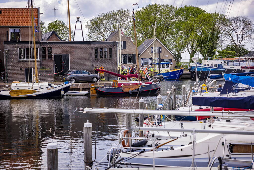 Schipper redt persoon uit het water