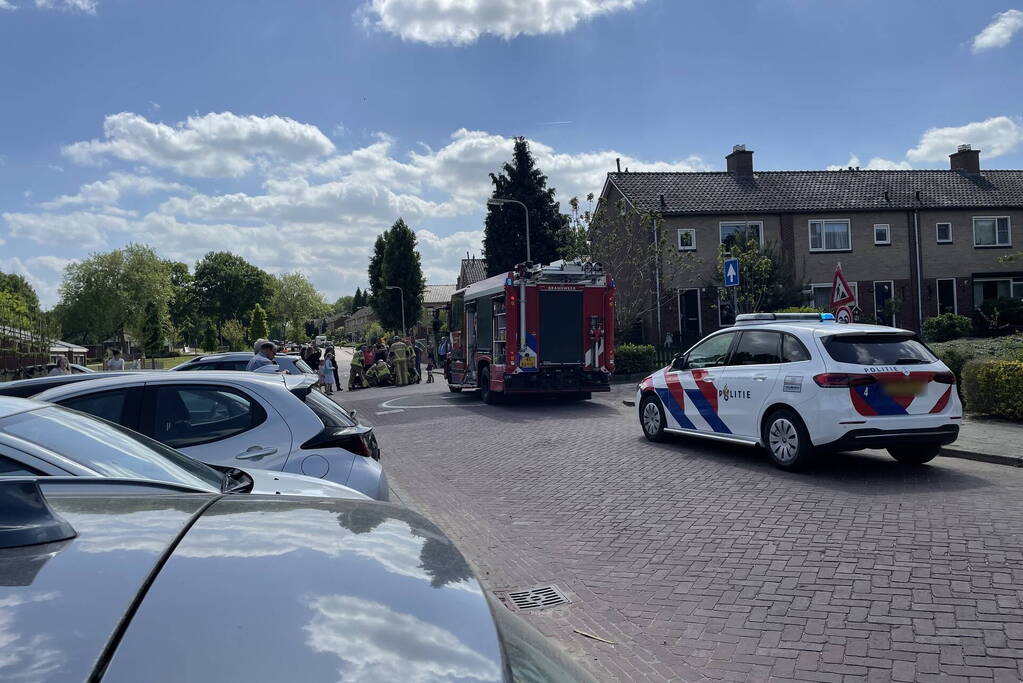 Kind vast in spaken van fiets