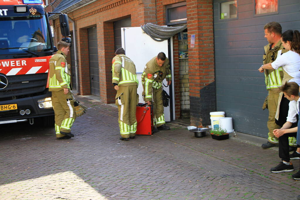 Vlam slaat in de pan bij restaurant