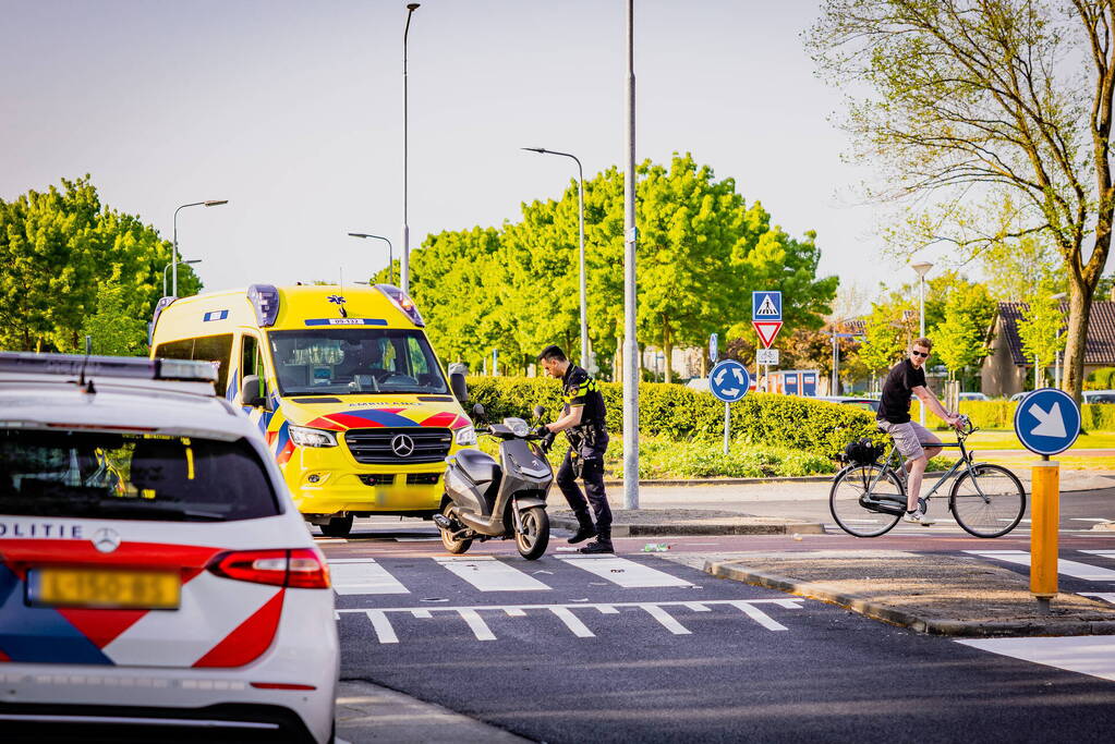 Scooter met twee opzittenden aangereden
