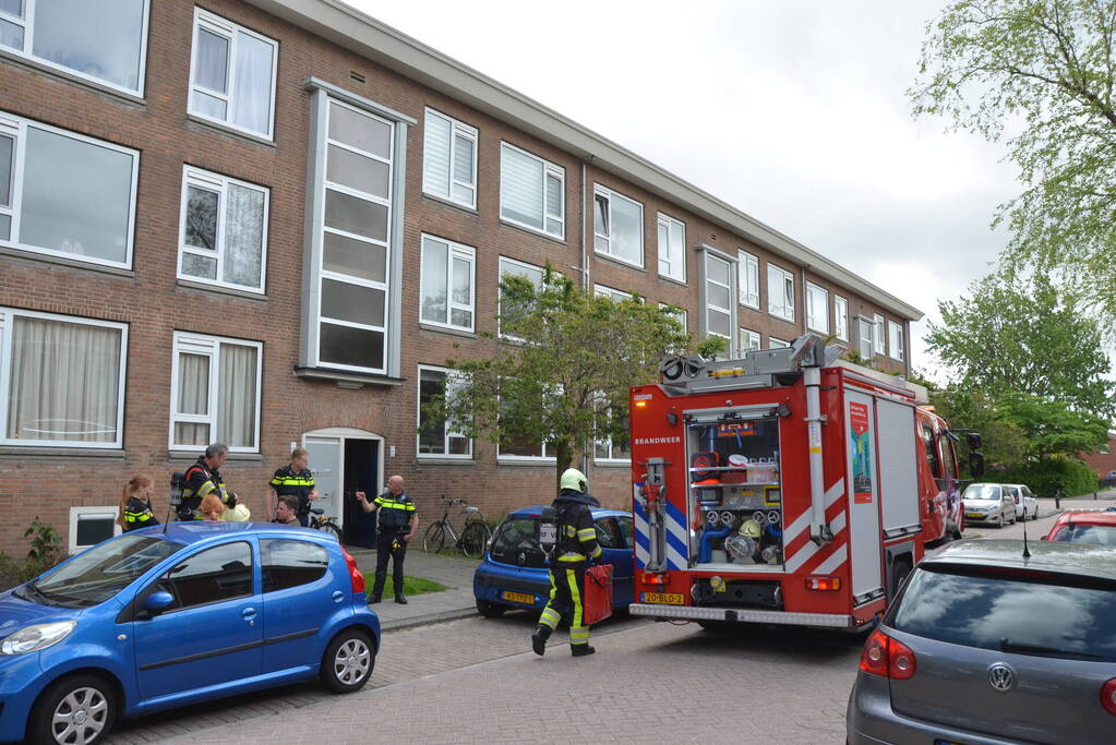 Brand in keuken van portiekwoning