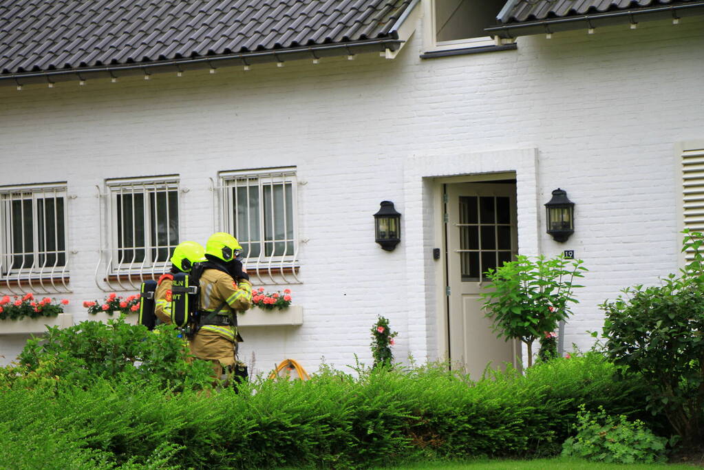 Lichte rookontwikkeling bij brand in woning